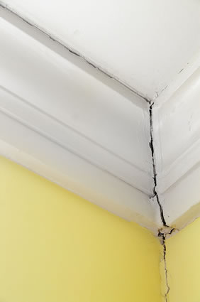 crack in crown moulding and wall